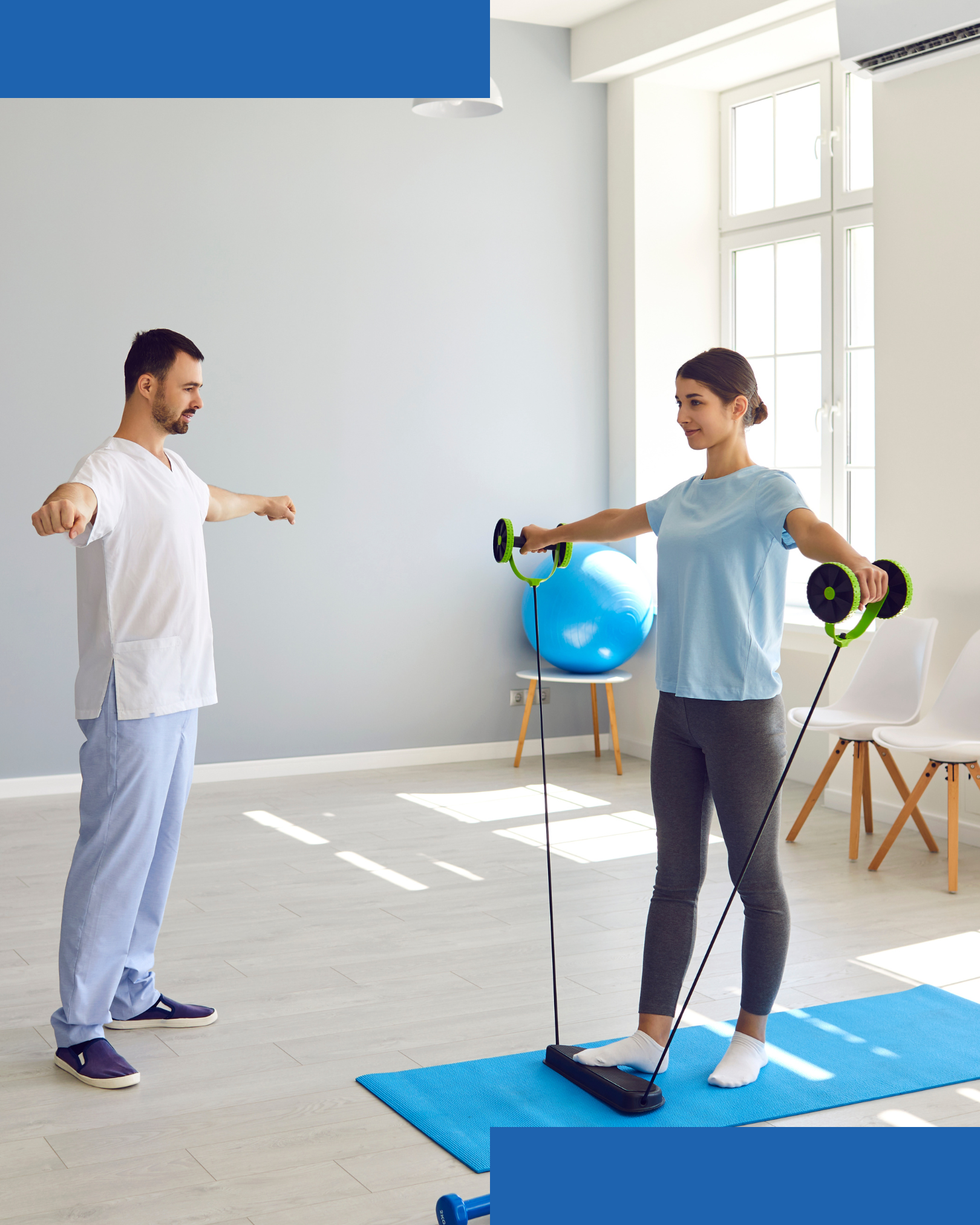 Physical therapist guiding a female patient during resistance band shoulder exercise in a clinic. Physical therapist guiding a female patient during resistance band shoulder exercise in a clinic.